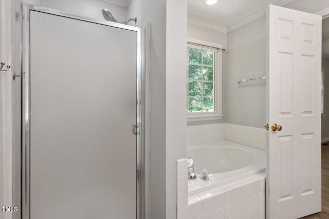 2474 Sumter Dr, Garner, NC 27529 - full bath with ornamental molding, a shower stall, and a garden tub