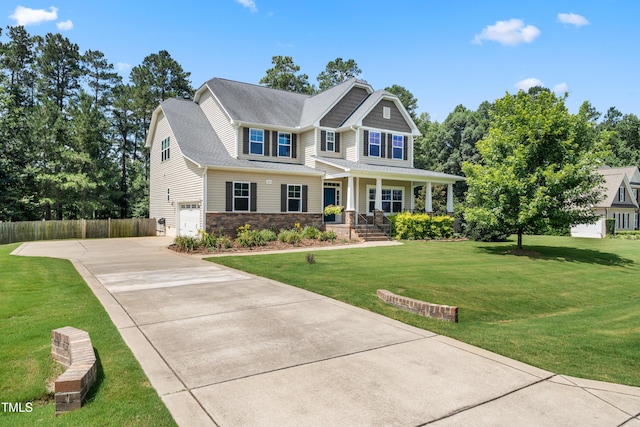 400 Swann Trl, Clayton, NC 27527 - craftsman inspired home featuring driveway, an attached garage, a porch, and stone siding