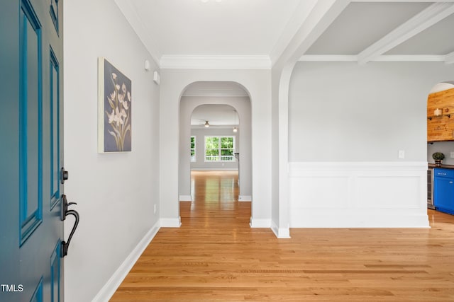 400 Swann Trl, Clayton, NC 27527 - foyer entrance featuring light wood-style flooring, crown molding, and arched walkways