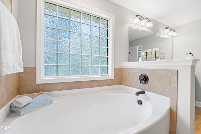 400 Swann Trl, Clayton, NC 27527 - full bath with healthy amount of natural light and a garden tub