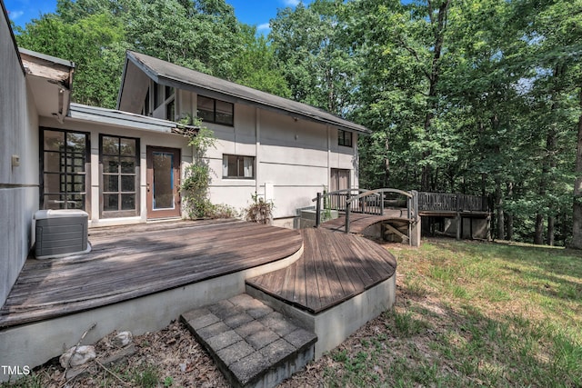 8510 Dunlee Falls Rd, Raleigh, NC 27613 - wooden deck featuring a lawn