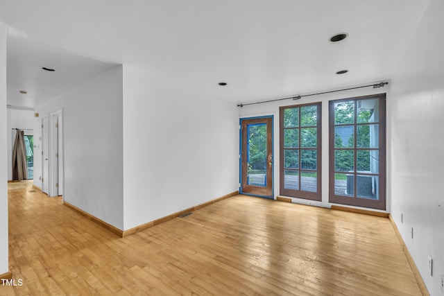 8510 Dunlee Falls Rd, Raleigh, NC 27613 - spare room featuring light wood-style floors and baseboards