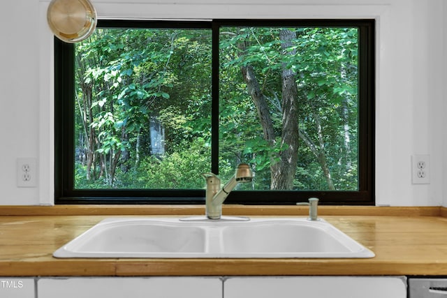 8510 Dunlee Falls Rd, Raleigh, NC 27613 - kitchen view of a sink and butcher block counters