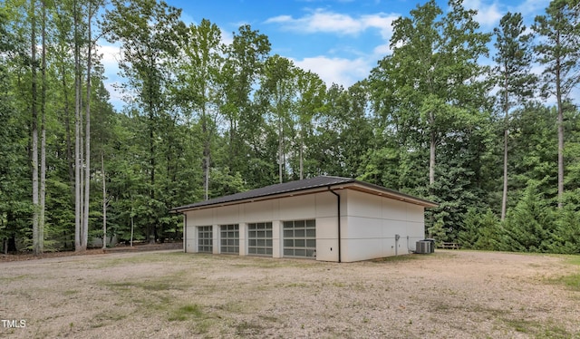 8510 Dunlee Falls Rd, Raleigh, NC 27613 - detached garage with a wooded view