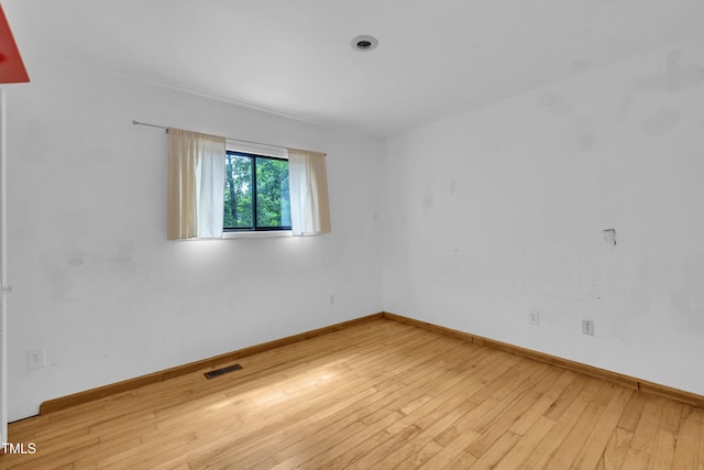 8510 Dunlee Falls Rd, Raleigh, NC 27613 - unfurnished room featuring wood-type flooring and baseboards
