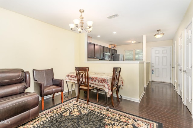 7819 River Field Dr, Raleigh, NC 27616 - dining area featuring a chandelier, dark wood-style flooring, and recessed lighting