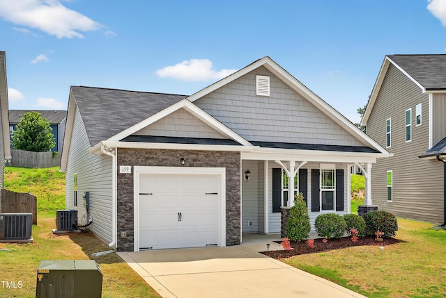 159 Forsyth Pkwy, Clayton, NC 27520 - craftsman-style house featuring a porch, an attached garage, concrete driveway, and stone siding