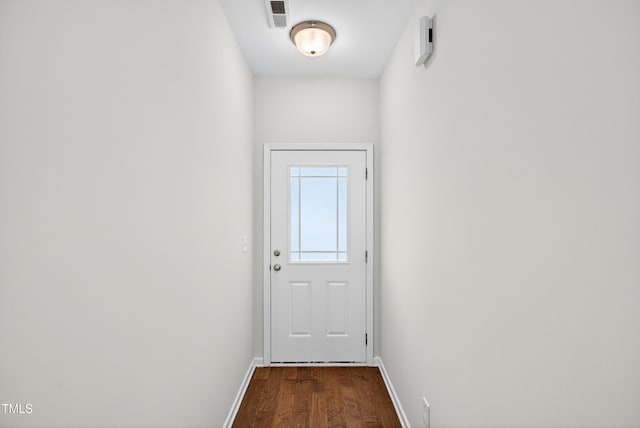 159 Forsyth Pkwy, Clayton, NC 27520 - doorway with dark wood-style floors and baseboards
