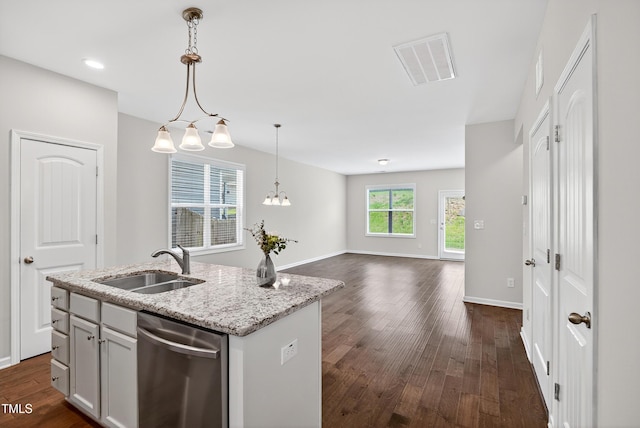 159 Forsyth Pkwy, Clayton, NC 27520 - kitchen with dishwasher, dark wood-style flooring, an island with sink, light stone counters, and recessed lighting