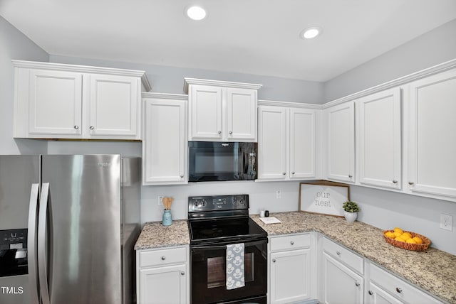 159 Forsyth Pkwy, Clayton, NC 27520 - kitchen with black appliances, white cabinetry, light stone counters, and recessed lighting