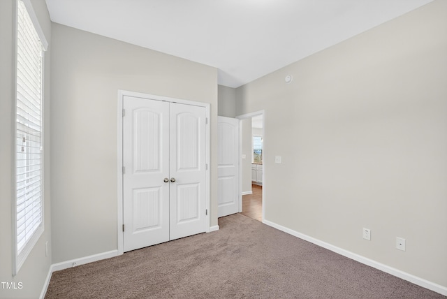 159 Forsyth Pkwy, Clayton, NC 27520 - unfurnished bedroom with carpet and a closet
