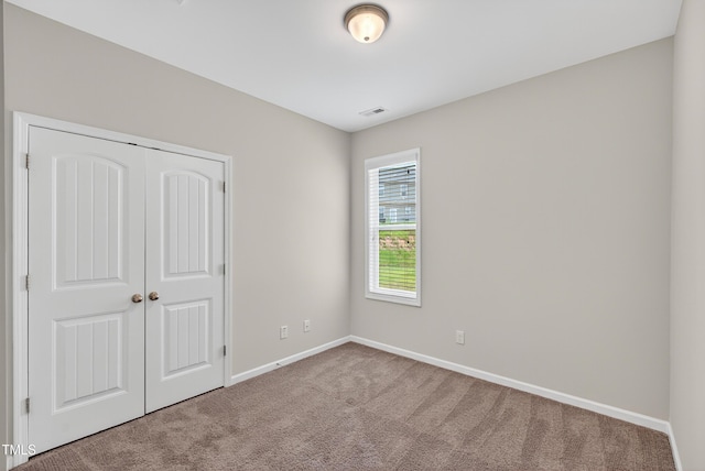 159 Forsyth Pkwy, Clayton, NC 27520 - unfurnished bedroom with carpet floors and a closet