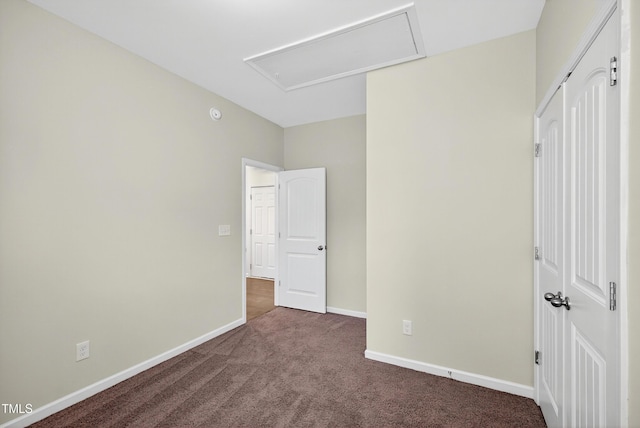 159 Forsyth Pkwy, Clayton, NC 27520 - unfurnished bedroom with carpet floors and attic access