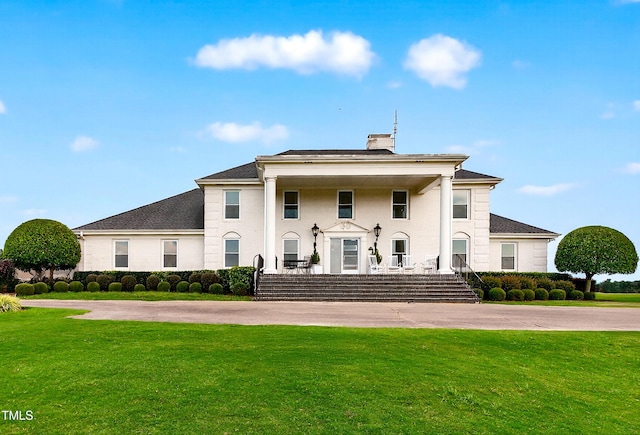 159 Forsyth Pkwy, Clayton, NC 27520 - neoclassical home with a front lawn and a porch