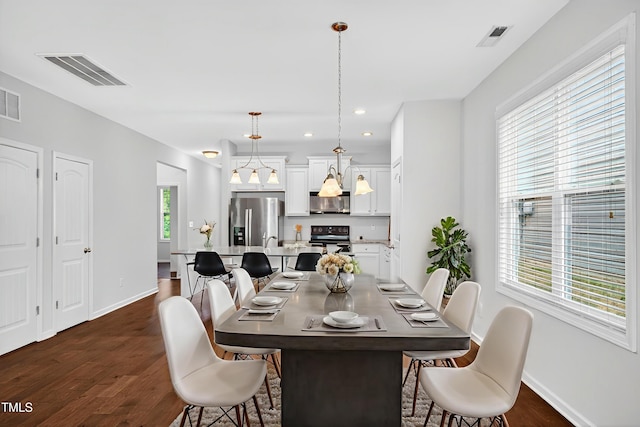 159 Forsyth Pkwy, Clayton, NC 27520 - dining space featuring dark wood-type flooring and recessed lighting