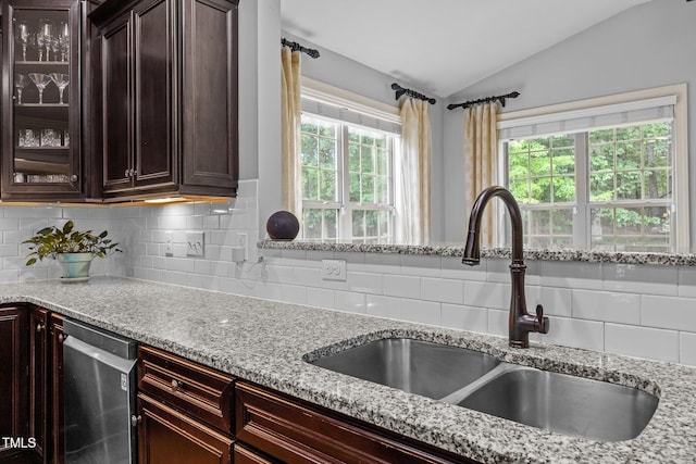 3036 Lawson Walk Way, Rolesville, NC 27571 - kitchen with dishwasher, vaulted ceiling, decorative backsplash, and light stone countertops