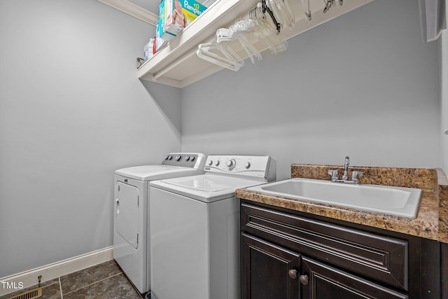 3036 Lawson Walk Way, Rolesville, NC 27571 - washroom featuring washer and clothes dryer, cabinet space, and crown molding