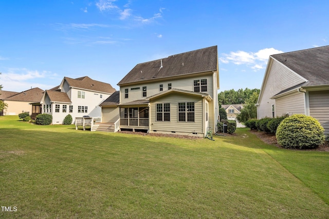 3036 Lawson Walk Way, Rolesville, NC 27571 - rear view of property with a sunroom, crawl space, and a lawn