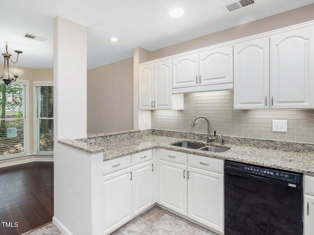 3811 Carnegie Ln, Raleigh, NC 27612 - kitchen featuring dishwasher, decorative backsplash, white cabinets, and recessed lighting
