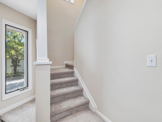 3811 Carnegie Ln, Raleigh, NC 27612 - stairs with carpet floors and baseboards