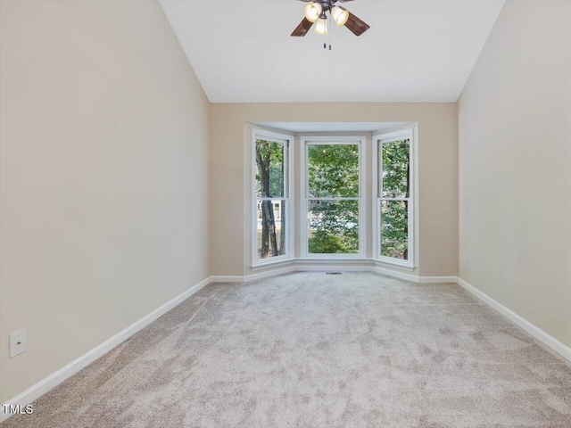 3811 Carnegie Ln, Raleigh, NC 27612 - carpeted empty room featuring ceiling fan and lofted ceiling