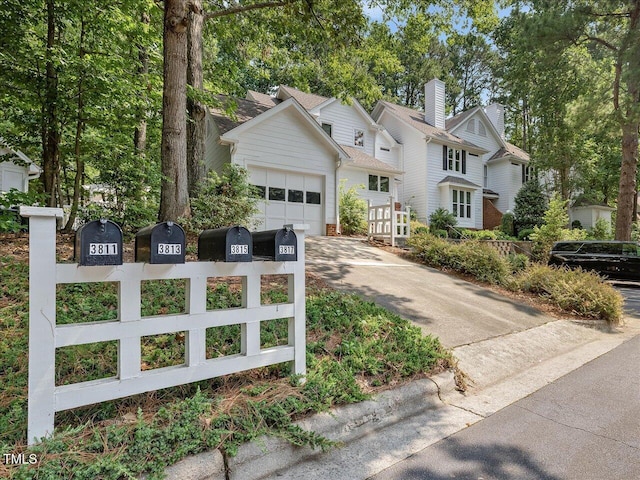 3811 Carnegie Ln, Raleigh, NC 27612 - view of front of home featuring concrete driveway and an attached garage