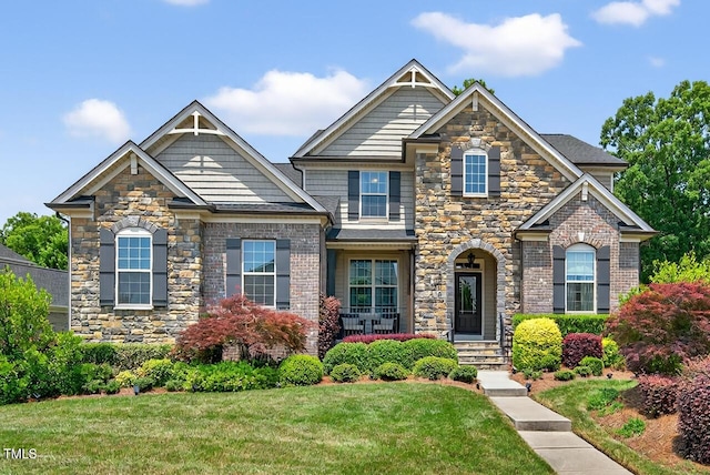 1806 Pattersons Mill Rd, Durham, NC 27703 - craftsman house with a front yard, stone siding, and brick siding