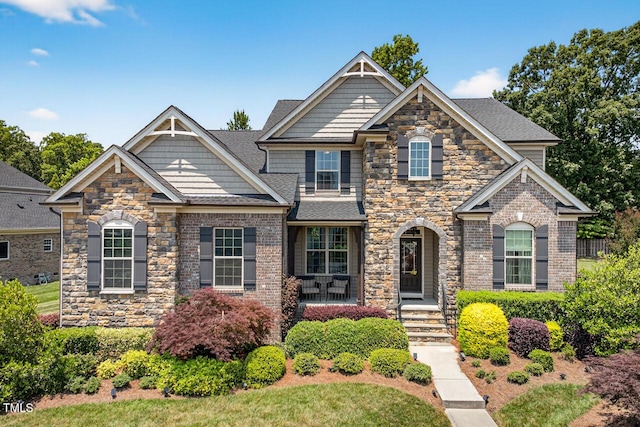 1806 Pattersons Mill Rd, Durham, NC 27703 - craftsman house with stone siding, a porch, brick siding, and roof with shingles