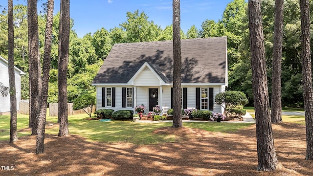 918 Circle Dr, Angier, NC 27501 - cape cod-style house featuring a shingled roof