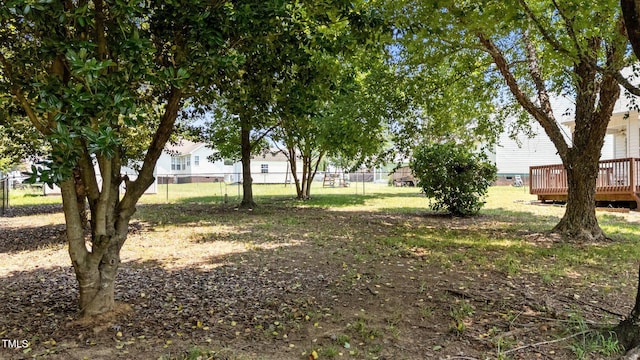 113 Kelly Ln, Clayton, NC 27520 - view of yard featuring a wooden deck