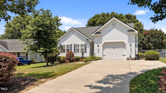 113 Kelly Ln, Clayton, NC 27520 - view of front of house with concrete driveway and a garage