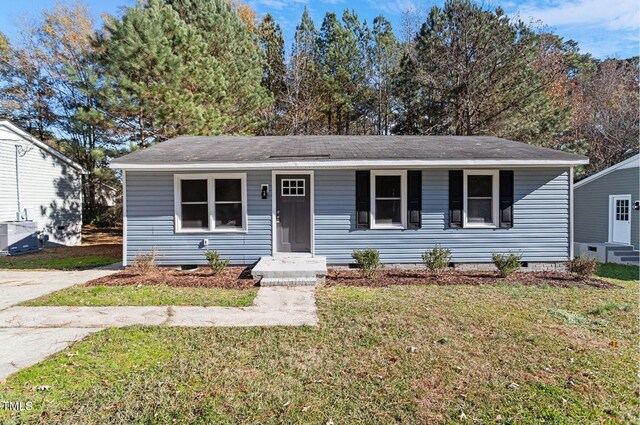 1203 Freeman Dr, Sanford, NC 27330 - view of front facade with crawl space and a front lawn