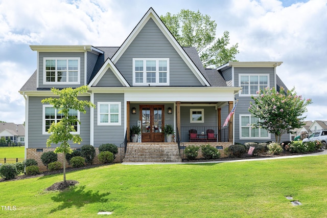447 Marcellus Way, Clayton, NC 27527 - craftsman house featuring a front yard, covered porch, and a shingled roof