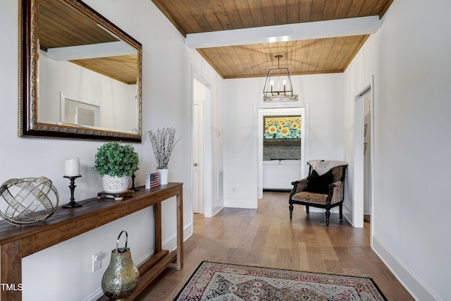 447 Marcellus Way, Clayton, NC 27527 - entryway featuring wood finished floors, wood ceiling, and a chandelier