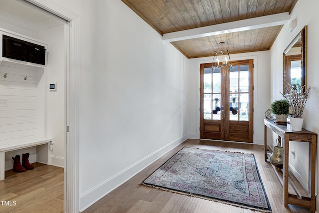 447 Marcellus Way, Clayton, NC 27527 - foyer with wood finished floors, a wood ceiling with exposed beams, and french doors