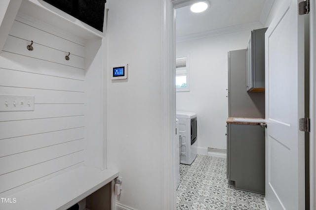 447 Marcellus Way, Clayton, NC 27527 - laundry room with baseboards and ornamental molding