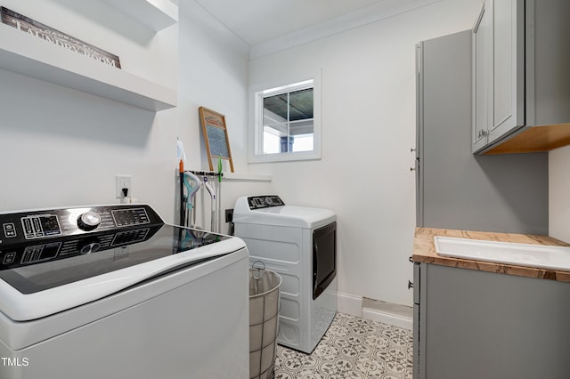 447 Marcellus Way, Clayton, NC 27527 - laundry room with cabinet space and separate washer and dryer