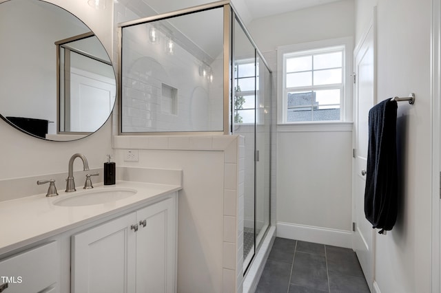 447 Marcellus Way, Clayton, NC 27527 - bathroom with vanity, a stall shower, and tile patterned floors