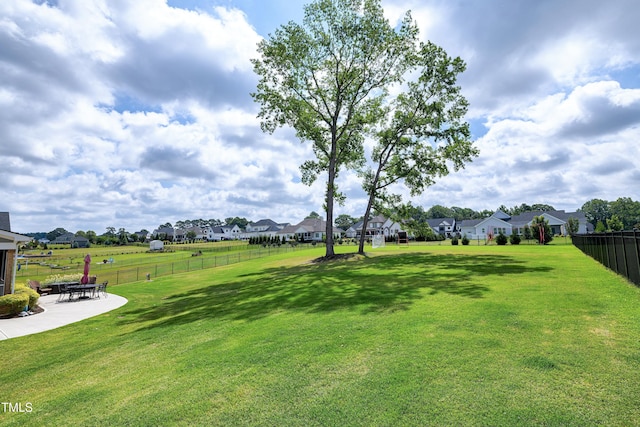 447 Marcellus Way, Clayton, NC 27527 - view of yard featuring a residential view and a patio