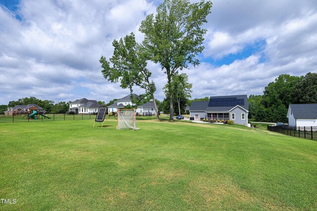 447 Marcellus Way, Clayton, NC 27527 - view of yard with a playground