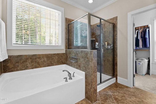 149 Hadley Ln, Clayton, NC 27527 - bathroom featuring a bath, a stall shower, crown molding, and a spacious closet