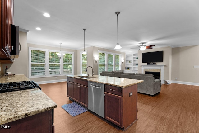 149 Hadley Ln, Clayton, NC 27527 - kitchen featuring dishwasher, ceiling fan, crown molding, wood finished floors, and a center island with sink