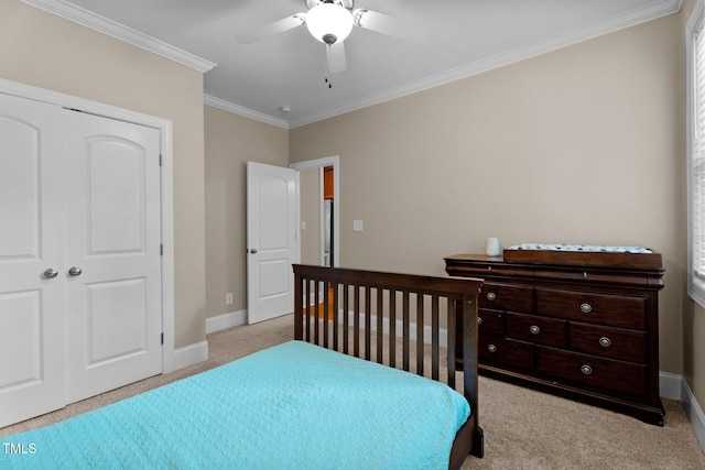 149 Hadley Ln, Clayton, NC 27527 - bedroom featuring light colored carpet, crown molding, a ceiling fan, and a closet