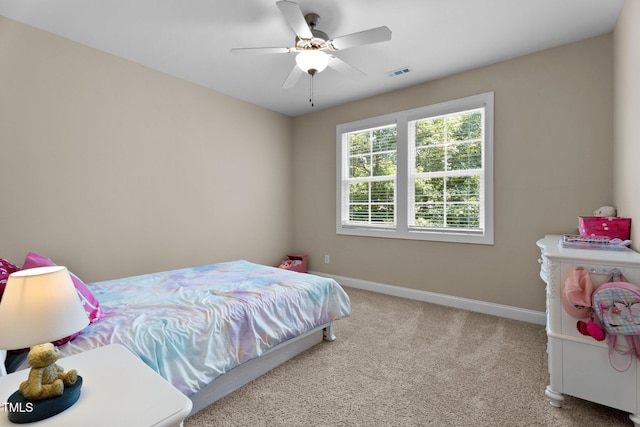 149 Hadley Ln, Clayton, NC 27527 - carpeted bedroom featuring baseboards and a ceiling fan