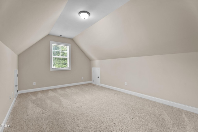 149 Hadley Ln, Clayton, NC 27527 - bonus room featuring light carpet and vaulted ceiling