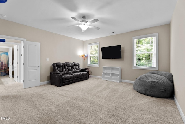 149 Hadley Ln, Clayton, NC 27527 - carpeted living room with ceiling fan and baseboards