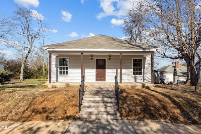112 Edgewood Dr, Roxboro, NC 27573 - view of front of house featuring covered porch and a shingled roof