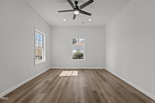 112 Edgewood Dr, Roxboro, NC 27573 - unfurnished room with plenty of natural light, wood finished floors, a ceiling fan, and recessed lighting