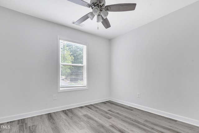 1213 Grant St, Durham, NC 27701 - empty room featuring wood finished floors and a ceiling fan