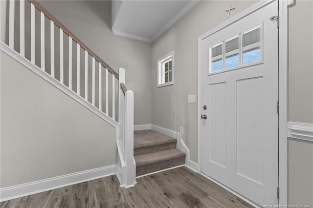 283 Leach Creek Dr, Raeford, NC 28376 - entryway featuring ornamental molding, stairs, and wood finished floors